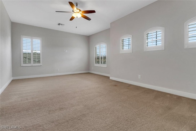 7787 Martino Cir, Naples, FL 34112 - unfurnished room with ceiling fan and light carpet