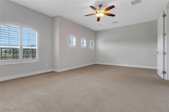 7787 Martino Cir, Naples, FL 34112 - spare room with light carpet and ceiling fan