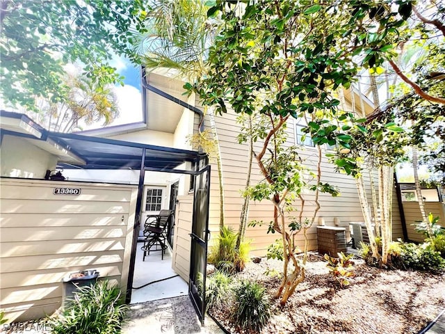 entrance to property featuring central AC