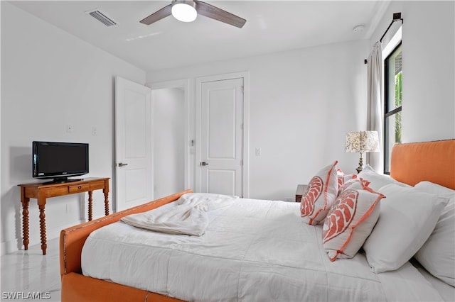 bedroom featuring ceiling fan