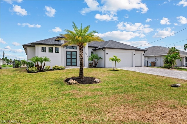 view of front facade featuring a front lawn and a garage