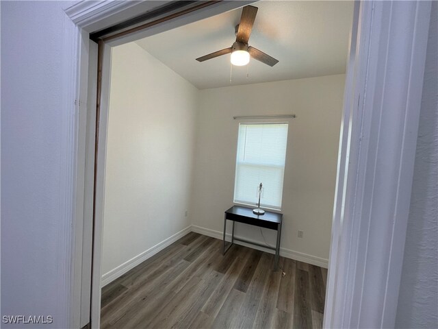 empty room featuring hardwood / wood-style floors and ceiling fan