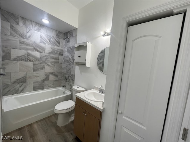 full bathroom with shower / bath combination, toilet, vanity, and wood-type flooring