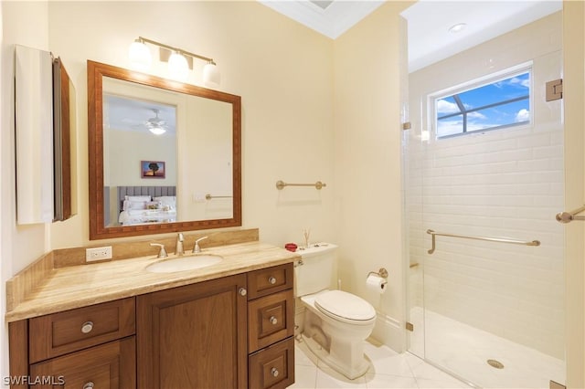 bathroom featuring vanity, tile patterned floors, toilet, and walk in shower