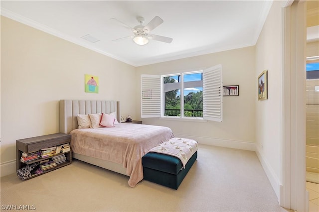 bedroom with ornamental molding, carpet, and ceiling fan