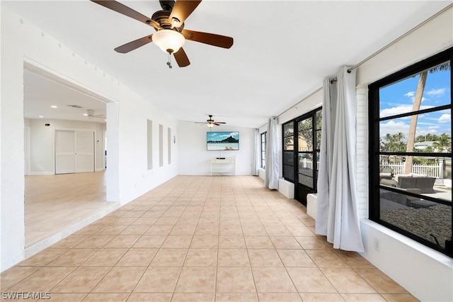 3461 Lakeview Dr, Naples, FL 34112 - corridor with light tile patterned flooring, healthy amount of natural light, and recessed lighting