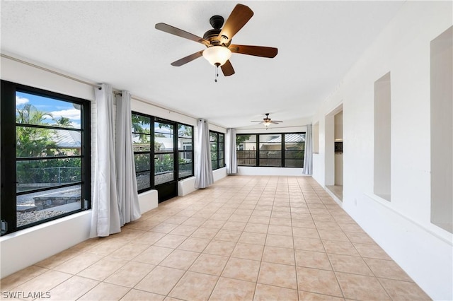 3461 Lakeview Dr, Naples, FL 34112 - unfurnished sunroom featuring tile patterned flooring