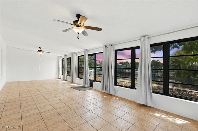 3461 Lakeview Dr, Naples, FL 34112 - unfurnished sunroom with tile patterned flooring and healthy amount of natural light