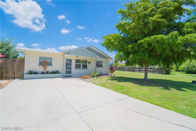 ranch-style house with a front yard