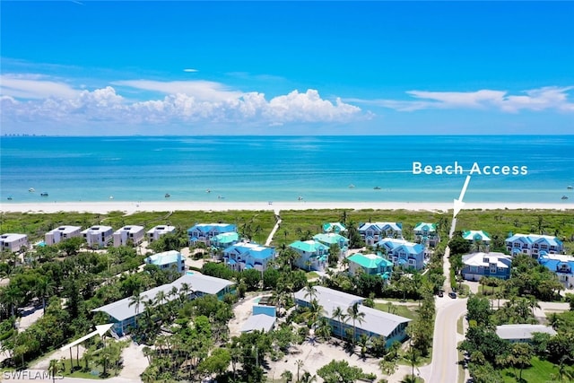 aerial view featuring a beach view and a water view