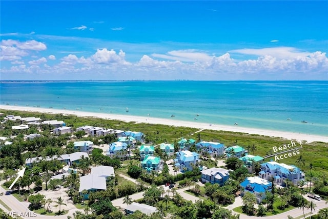 drone / aerial view with a view of the beach and a water view