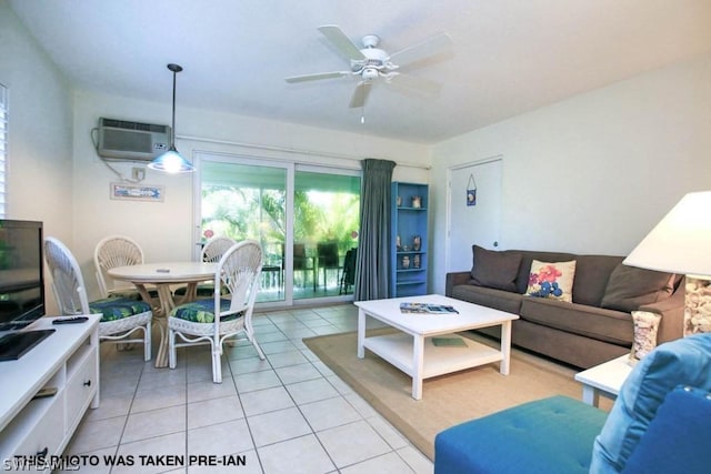 living room featuring light tile patterned flooring, ceiling fan, and a wall mounted AC