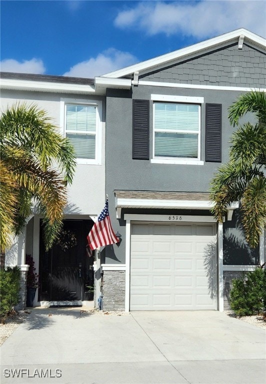 view of front of property with a garage