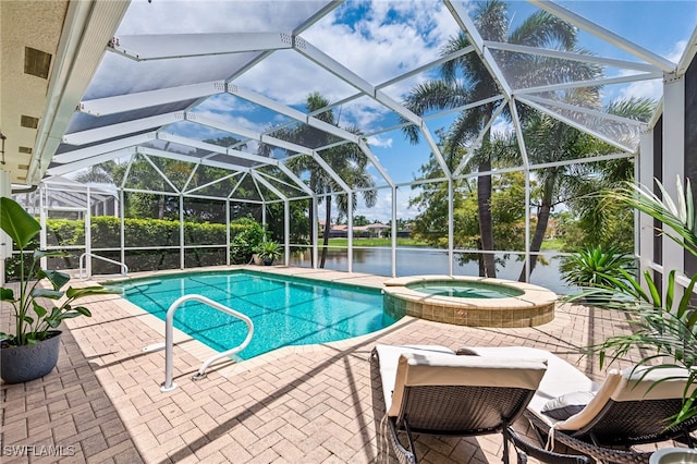 view of pool with a water view, a patio, an in ground hot tub, and glass enclosure