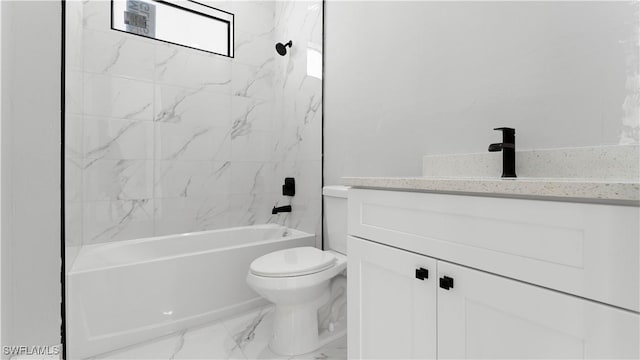 full bathroom with vanity, toilet, and tiled shower / bath combo