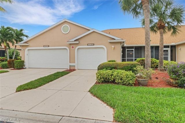 single story home with a garage