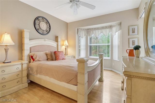 bedroom featuring light wood-type flooring and ceiling fan