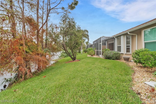 view of yard with a lanai