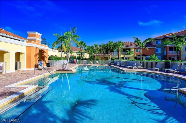 view of pool featuring a patio