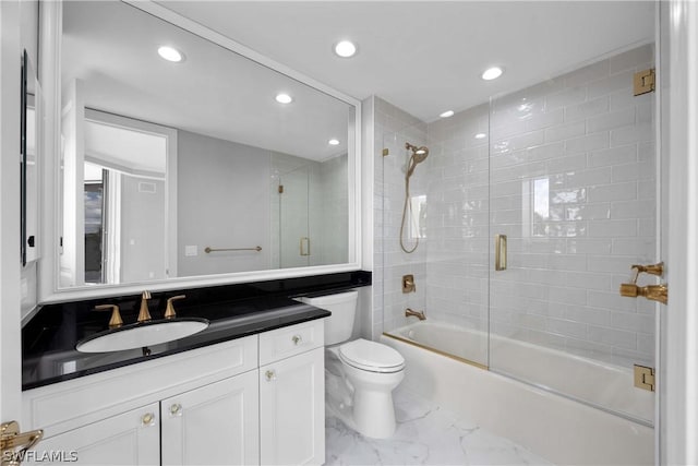 full bath with marble finish floor, toilet, recessed lighting, vanity, and shower / bath combination with glass door