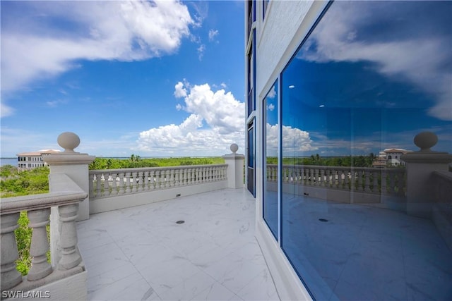 view of patio with a balcony