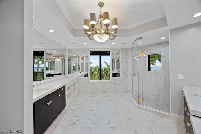 bathroom featuring a chandelier, a raised ceiling, a wealth of natural light, and walk in shower