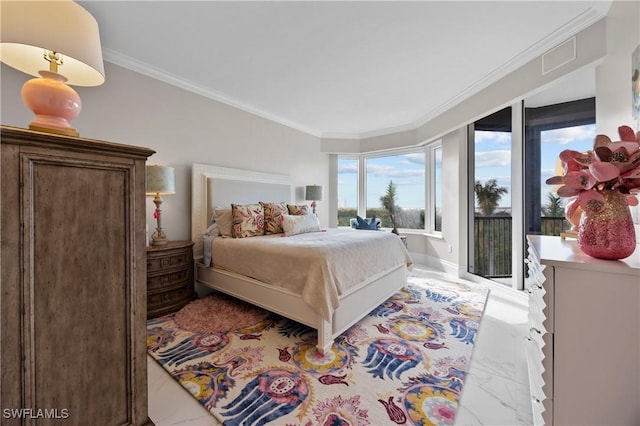 bedroom with crown molding and access to outside