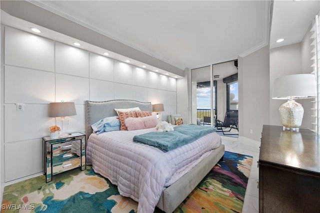 bedroom featuring expansive windows, marble finish floor, access to exterior, and recessed lighting