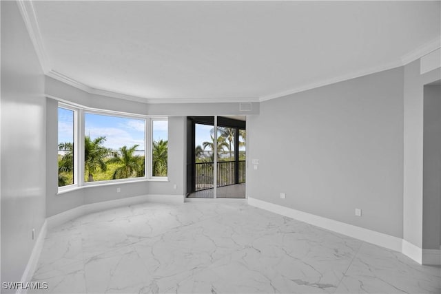 unfurnished room featuring baseboards, marble finish floor, and ornamental molding