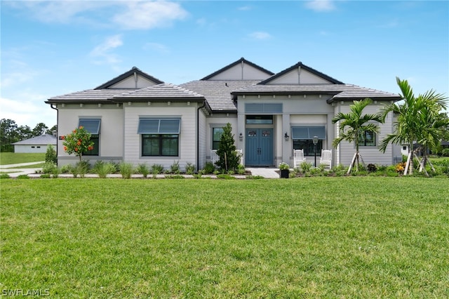 view of front of home with a front yard