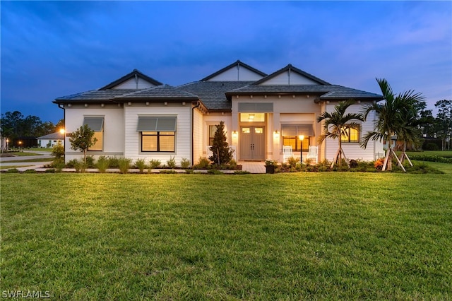 view of front facade with a front lawn