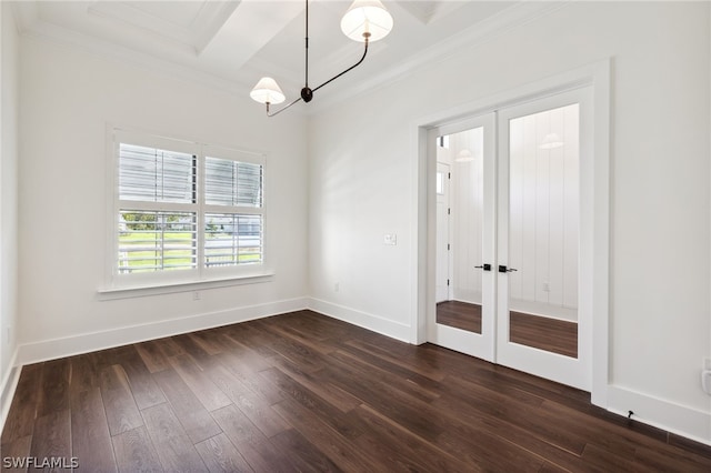 spare room with french doors, ornamental molding, dark wood-type flooring, and beamed ceiling