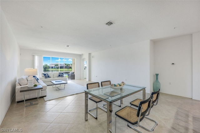 dining room with light tile patterned floors