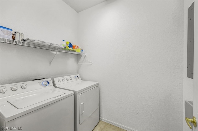 14721 Calusa Palms Dr Unit 103, Fort Myers, FL 33919 - laundry area featuring independent washer and dryer and baseboards