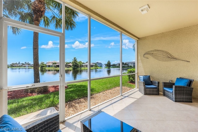 sunroom with a water view