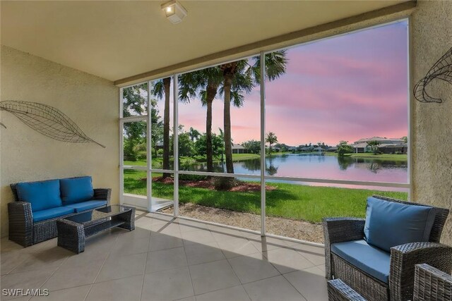 14721 Calusa Palms Dr Unit 103, Fort Myers, FL 33919 - sunroom / solarium with a water view and an outdoor hangout area