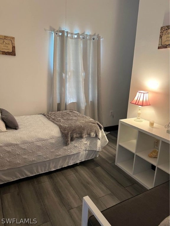 bedroom featuring wood-type flooring