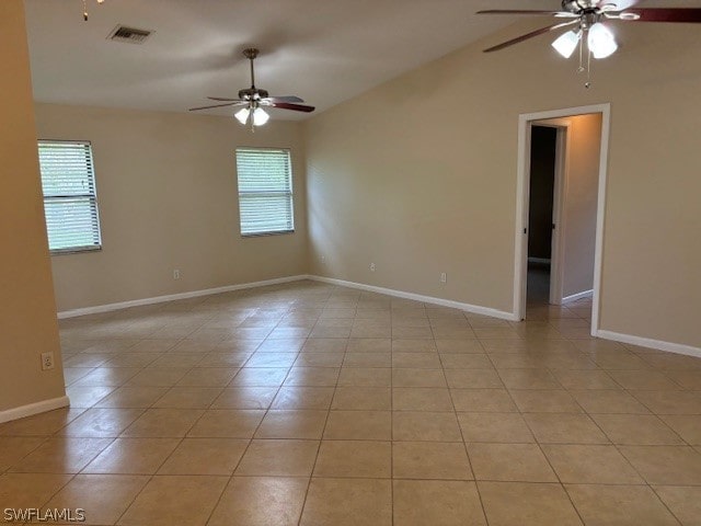 unfurnished room with light tile patterned flooring and ceiling fan