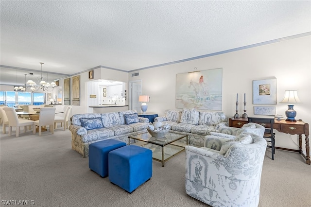 living room featuring an inviting chandelier, light carpet, and a textured ceiling