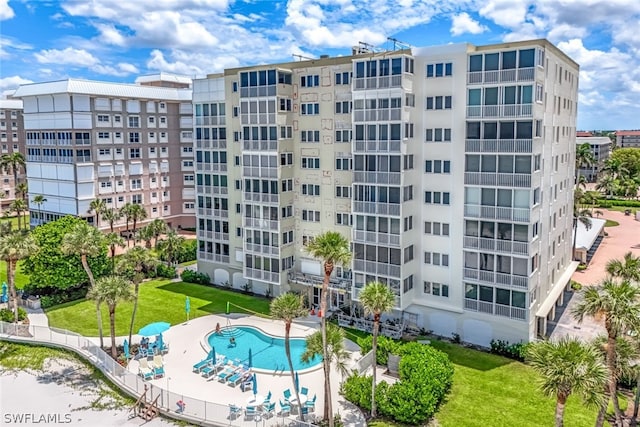 view of property featuring a community pool