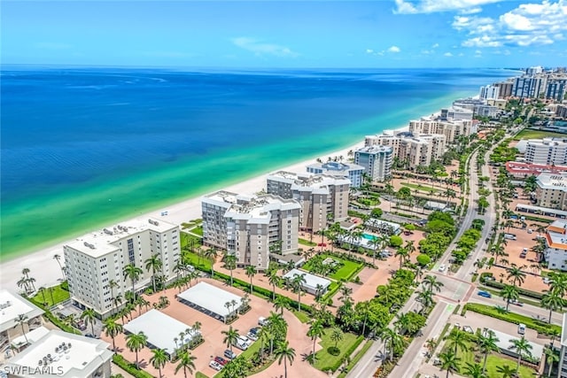 aerial view featuring a water view and a view of the beach