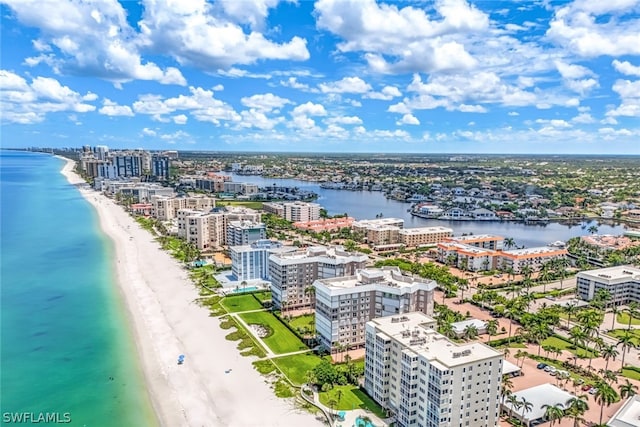 drone / aerial view with a view of the beach and a water view