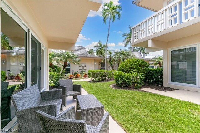 exterior space featuring an outdoor hangout area