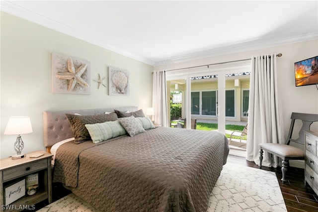 bedroom with crown molding and hardwood / wood-style floors