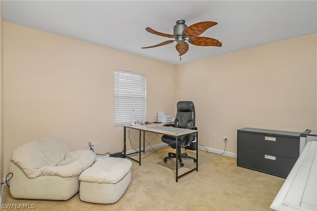 office featuring light colored carpet and ceiling fan