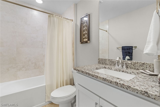 full bathroom featuring vanity, shower / tub combo with curtain, and toilet