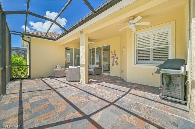 view of patio featuring outdoor lounge area, ceiling fan, a grill, and a lanai