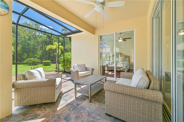 sunroom featuring a healthy amount of sunlight and beam ceiling