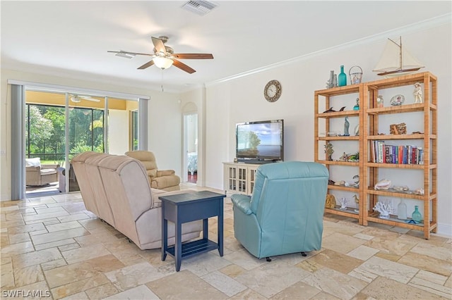 living room featuring ornamental molding and ceiling fan