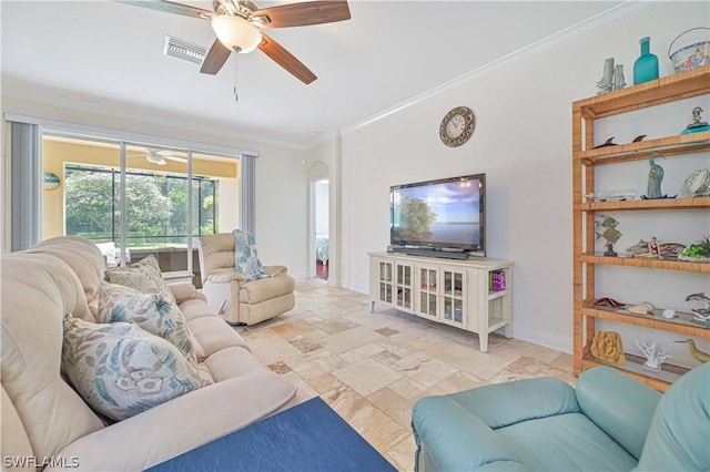 living room featuring ceiling fan and ornamental molding